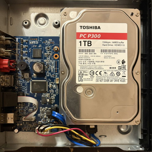 Dahua DH-XVR1B04-I DVR 4-channel with Toshiba 1TB HDD and power supply like new