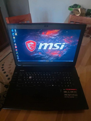 MSI GT72 laptop used, battery needs replacement, missing E key