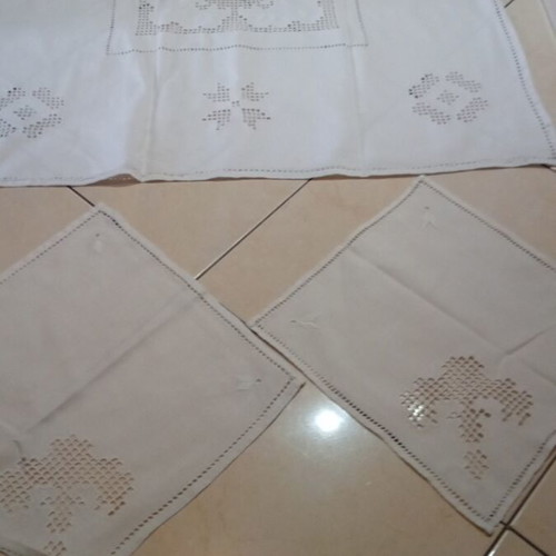 Handmade white table linen set with one large and two small doilies