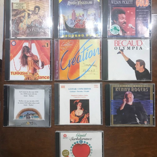 CDs of foreign music like new, 163 singles, doubles & triples