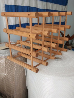 Wooden bottle rack with 12 slots like new