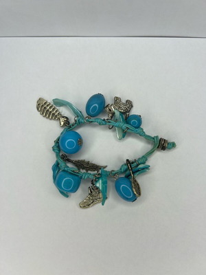 Bracelet used with blue beads and silver details