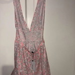 Fullah Sugah summer jumpsuit with open back, pink and white