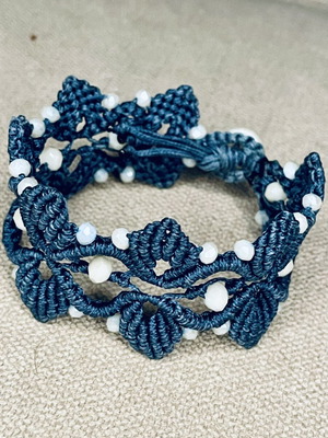 Handmade macrame bracelet with white beads, dark blue