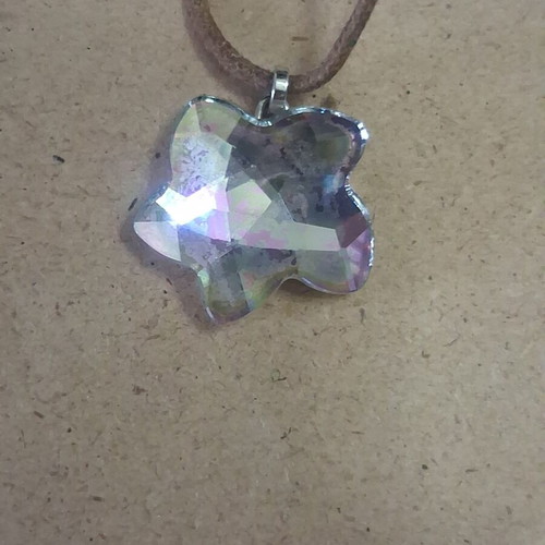 Swarovski vintage flower pendant with brown cord like new