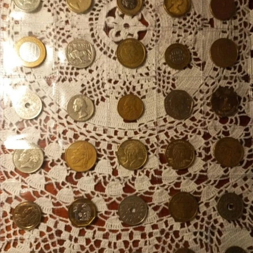 Coin album used with 159 coins from various countries