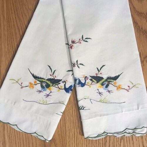 Pillowcases with peacocks used, hand-embroidered 1950s folk art