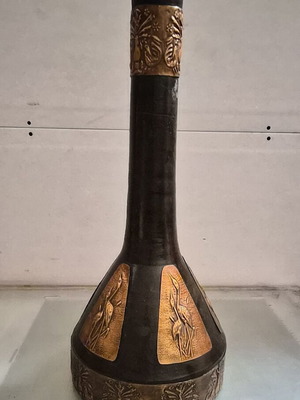 Vintage decorative vase with embossed copper motifs used