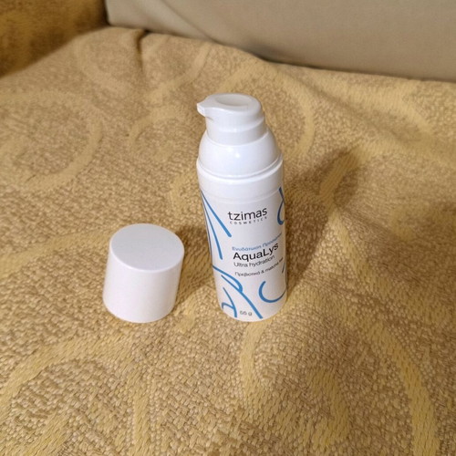 Empty face cream packaging 55g used