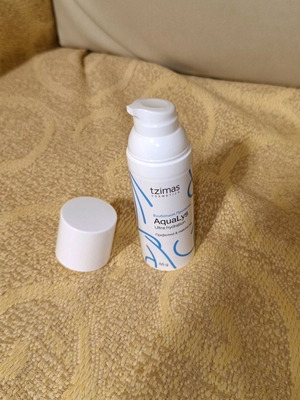 Empty face cream packaging 55g used