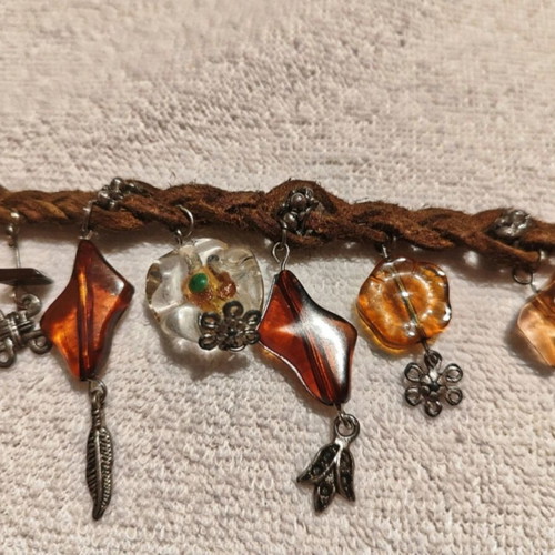 Anklet leather with various earth-tone charms, 27 cm, like new