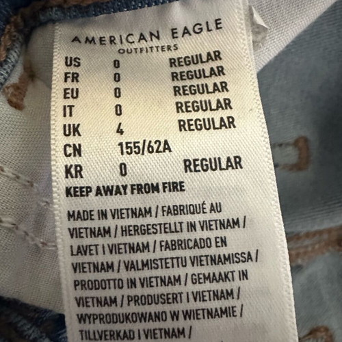 American Eagle stretch jean with rips new size S