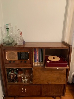 Vintage wooden console radio with turntable used