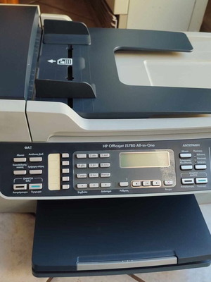 Πολυμηχάνημα hp officejet j5780 στο κουτί του.