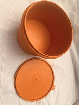 Tupperwear vintage deep circle orange container with lid used