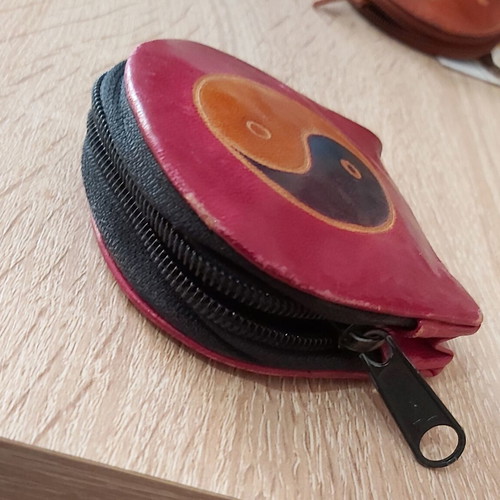 Small wallet like new with Ying Yang shape, shiny leather, red