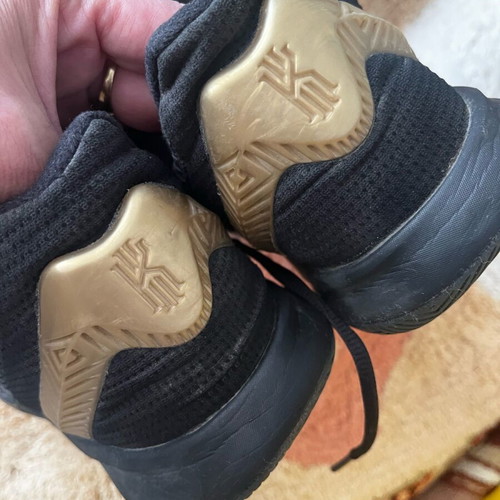 Nike athletic shoes size 42.5 used, black and gold