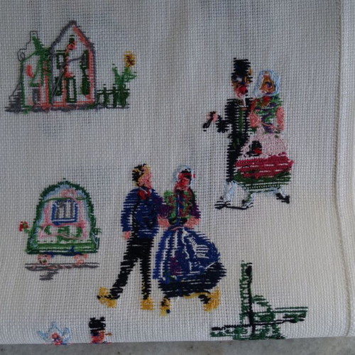 Embroidery with traditional costumes and Dutch scenes like new