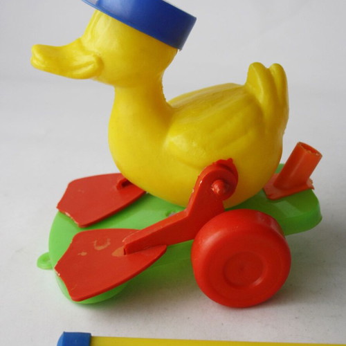 Plastic wheeled vintage 70's duck toy new with stick