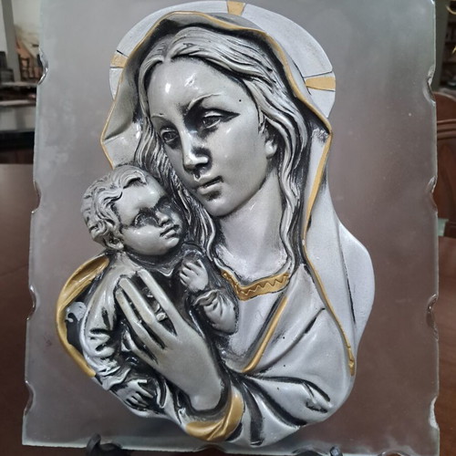 Embossed Virgin Mary image in glass frame like new