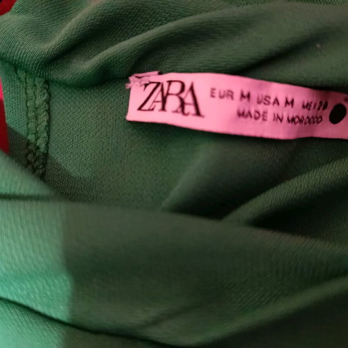 Zara maxi dress size M like new, green with unique hem pattern