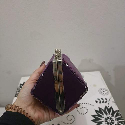Clutch bag polygonal like new with purple sequins