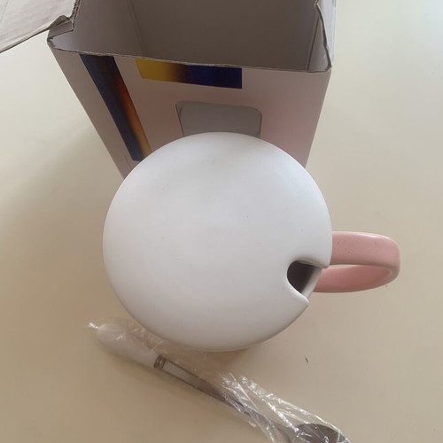 Cup with lid and spoon new, decorated with paw prints