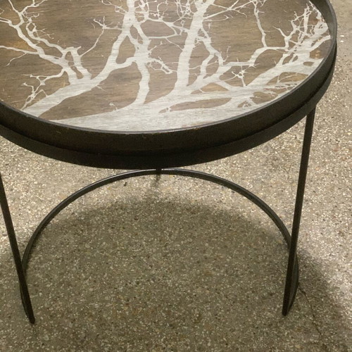 Decorative coffee table used with metal base and wooden top frame