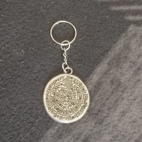 Phaistos Disc keychain used, in excellent condition