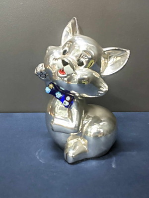Decorative silver-plated cat with music like new