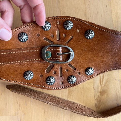 Camel leather belt used with metal details