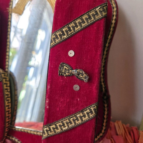 Antique mirror with velvet frame and doll, used 1950-1965