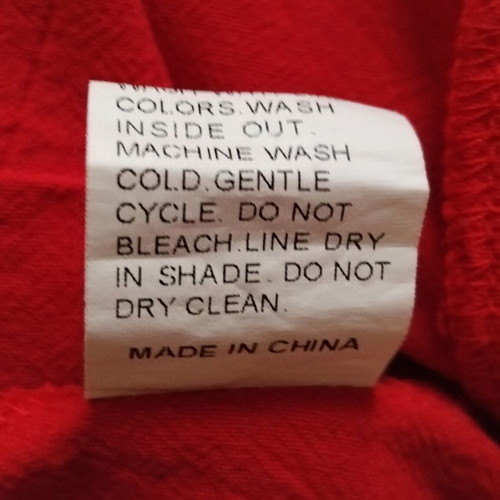 High-waisted women's red shorts like new with ruffles and pleats