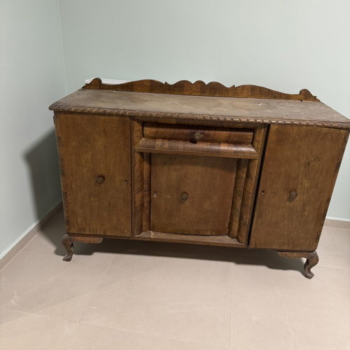 Vintage wooden buffet with carved details