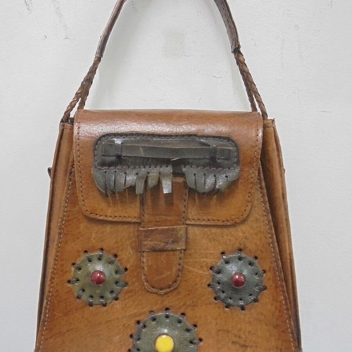 Vintage leather handbag with decorative ornaments, used, brown