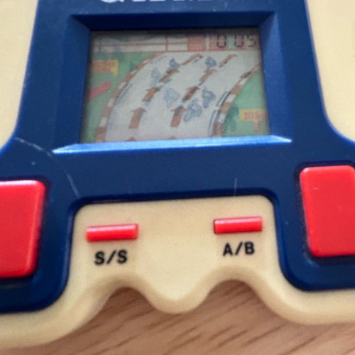 Moto racing handheld game used, vintage 80s collectible