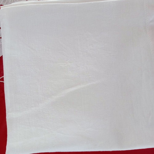 Handmade white jacquard tablecloth with embossed designs like new