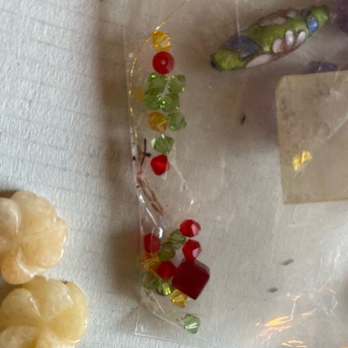 Swarovski crystals unused in various pierced sizes
