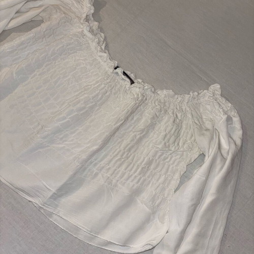 White blouse with ruffles and long sleeves like new