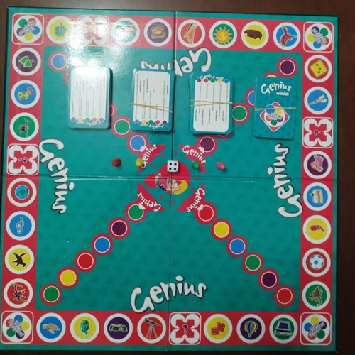 Genius board game used with cards, dice and instructions