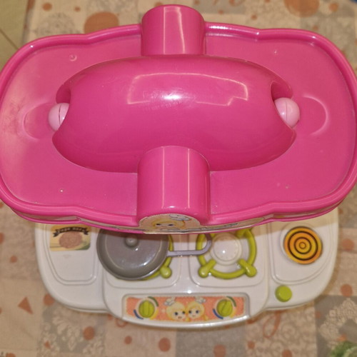 Children's kitchen playset like new with pot, knife, and fork