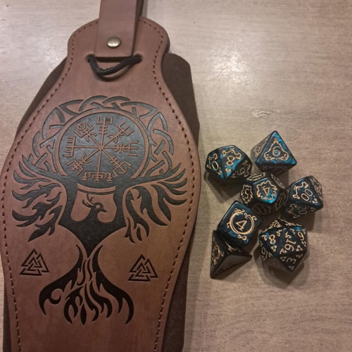 Brown leather dice bag with green D&D dragon dice