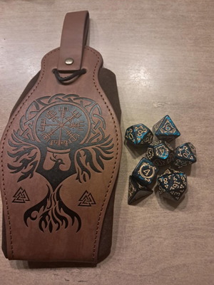 Brown leather dice bag with green D&D dragon dice