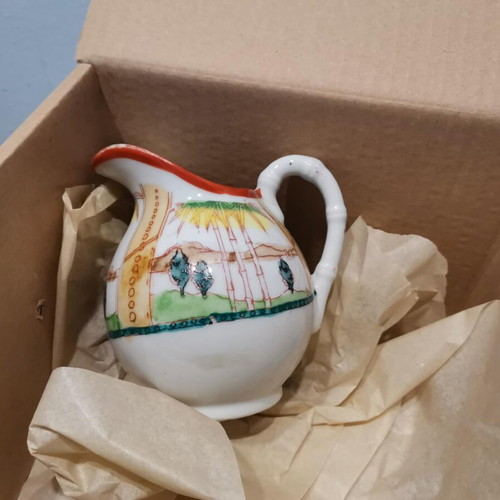 Porcelaine de Japon jug used with bamboo handle