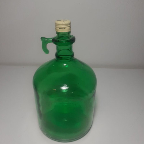 Boutatis bottle vintage glass used