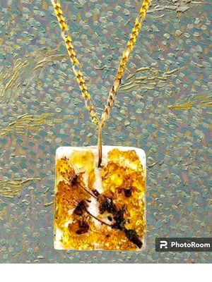 Handmade necklace with pendant and real almond blossoms in resin