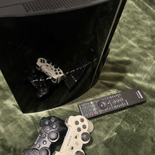 Sony PlayStation 3 Fat 80GB CECHK04 console used with 2 controllers and remote