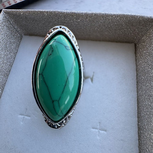 Ring size 9 new, green and silver