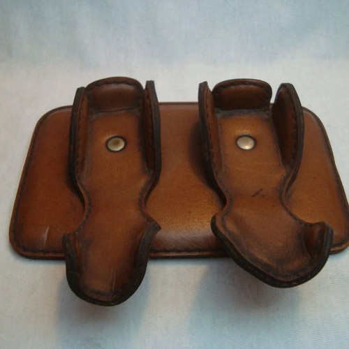 Vintage pipe stand for two tobacco pipes used, genuine leather