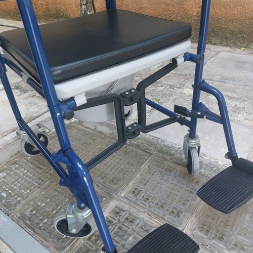 Commode wheelchair with metal frame, like new
